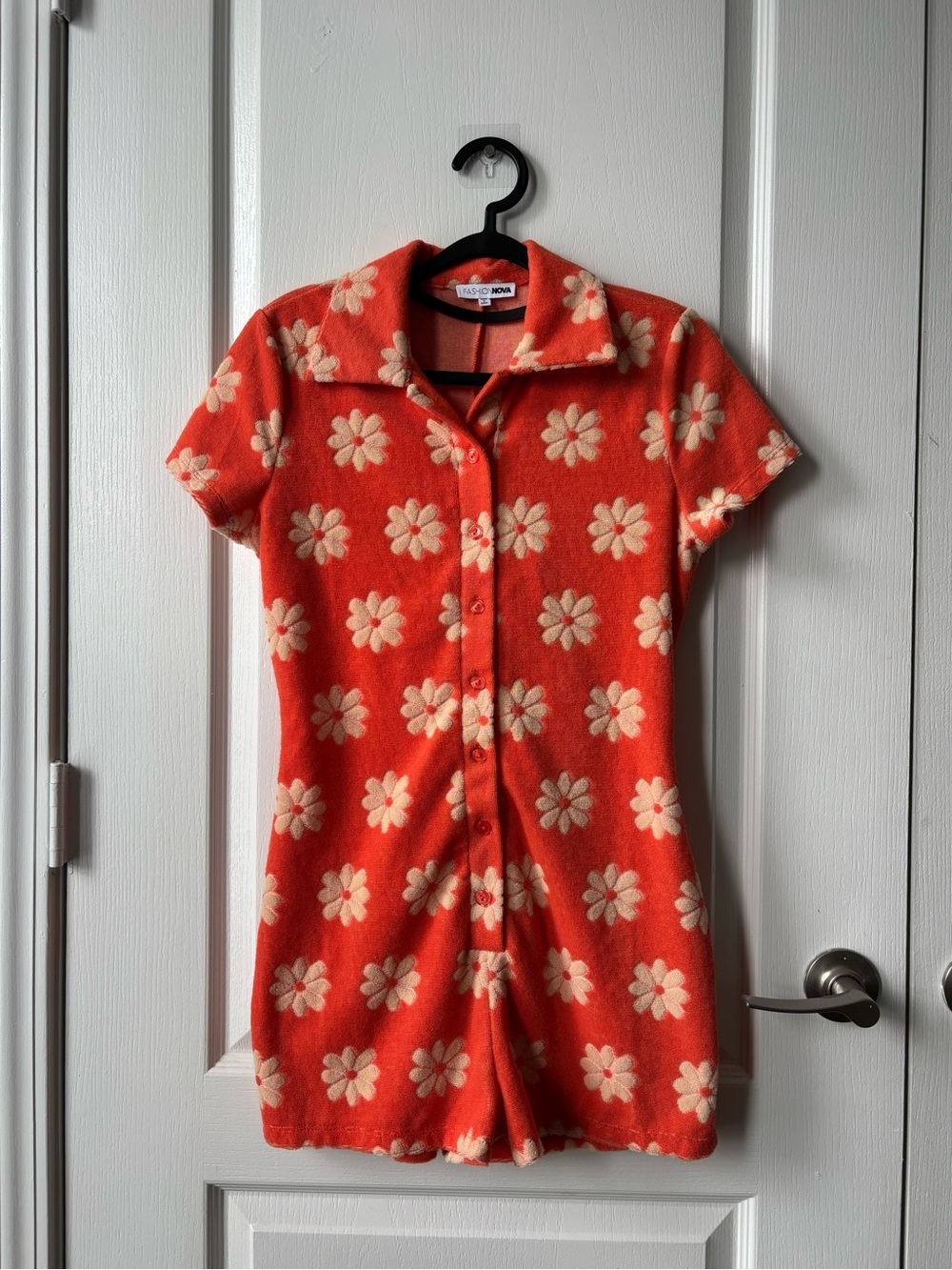 Vintage-Inspired Orange Daisy Knit Romper
